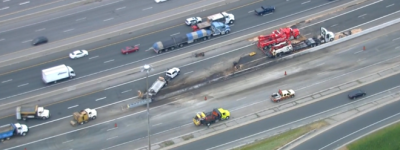 一辆拖挂卡车在401高速公路上翻车：士嘉堡西行车道关闭