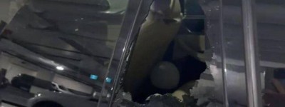 列治文市中心驚現西裝春報復性砸車