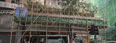 屋宇署：全部230幢私樓外牆棚網已移除