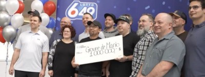 加国14名同事抱团买彩票终于中大奖 “零好多”