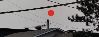 从好奇到害怕，加拿大人质疑周二傍晚橙色的太阳…