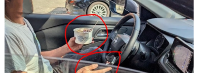 分心驾驶作死新境界！司机双手离盘喝奶昔刷手机当场抓包社死！