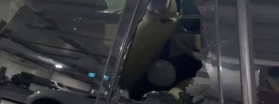 列治文市中心驚現西裝春報復性砸車