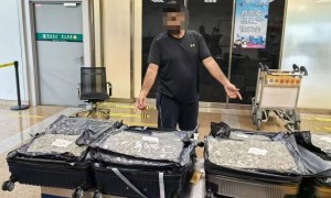 “借道”中国转运70公斤毒品，2名外籍过境人员被判刑