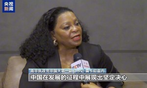 国际人士：中国共产党以人民为中心 成就发展奇迹